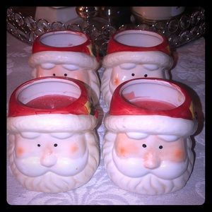 Set of 4 Santa candles. Very cute!